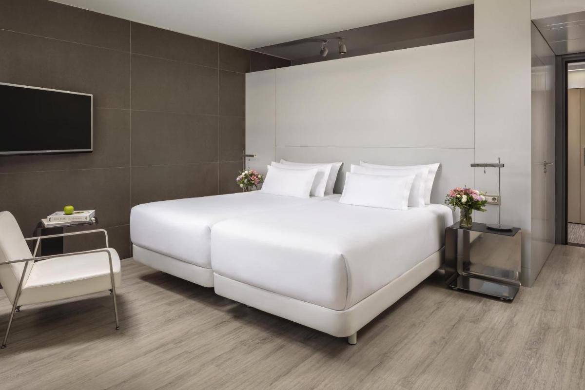 Cama o camas de una habitación en NH Collection Barcelona Constanza