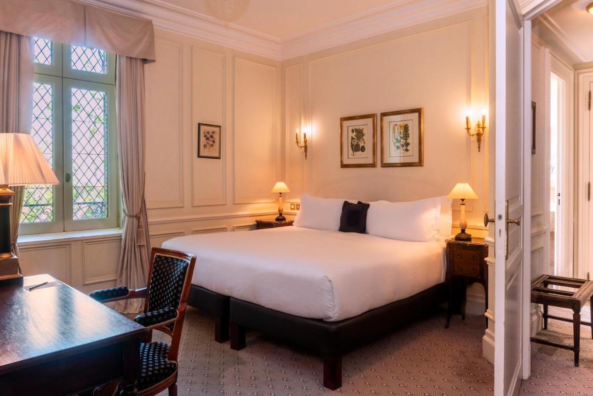 Un ou plusieurs lits dans un hébergement de l'établissement Hotel de la Cité Carcassonne - MGallery Collection