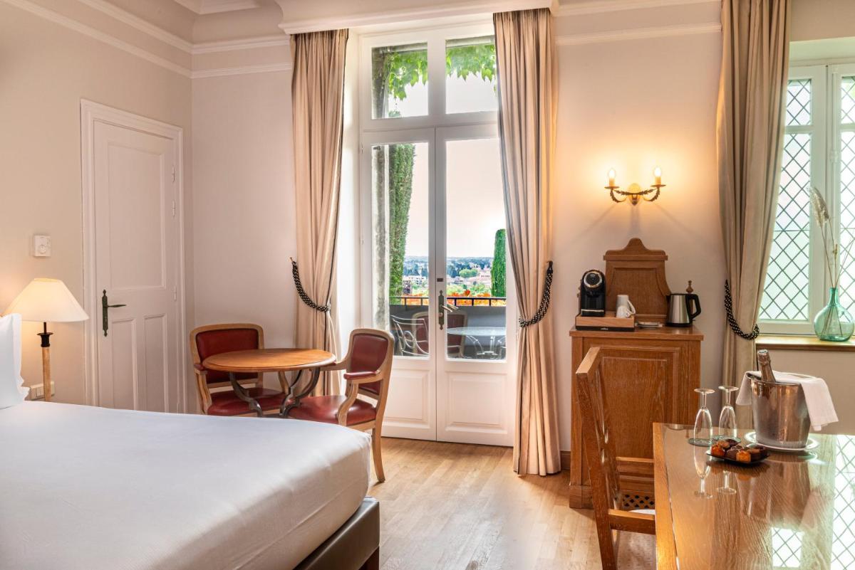 Un ou plusieurs lits dans un hébergement de l'établissement Hotel de la Cité Carcassonne - MGallery Collection