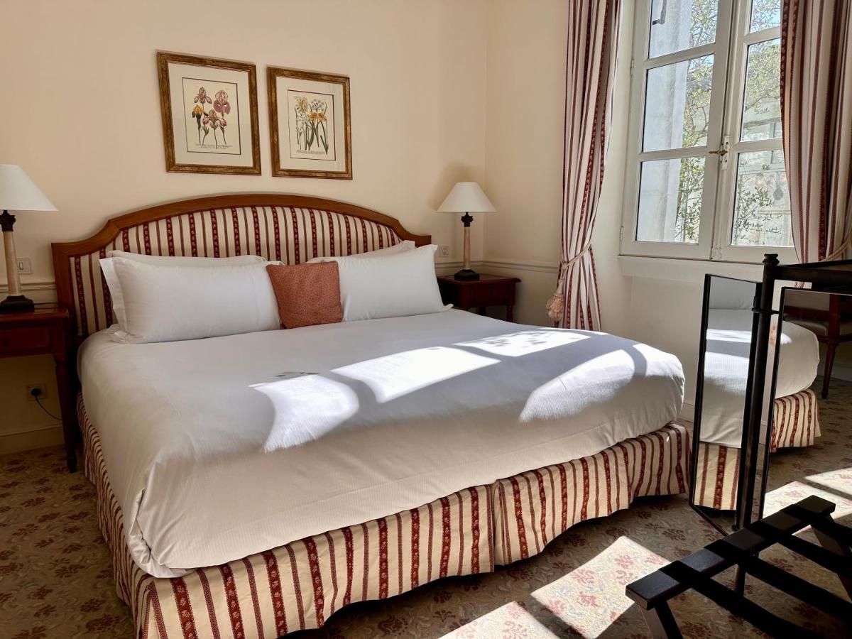 Un ou plusieurs lits dans un hébergement de l'établissement Hotel de la Cité Carcassonne - MGallery Collection