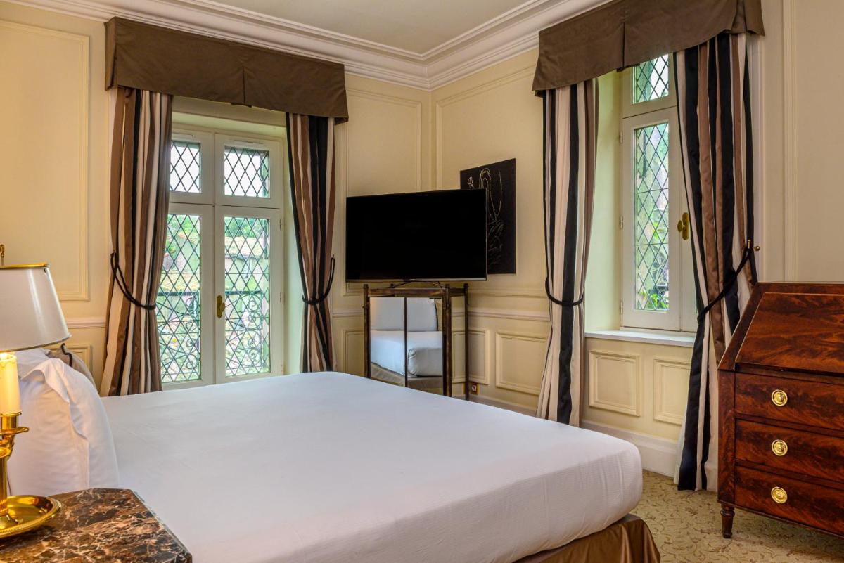 Télévision ou salle de divertissement dans l'établissement Hotel de la Cité Carcassonne - MGallery Collection