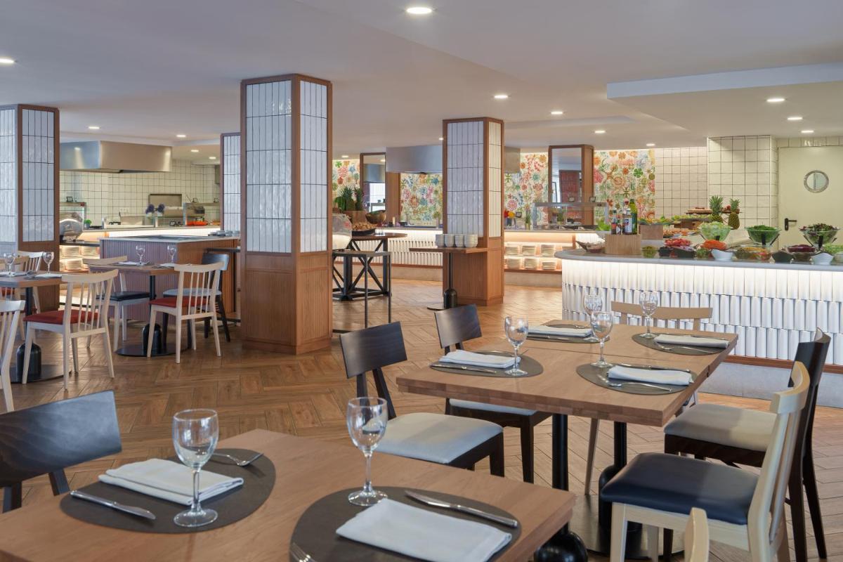 Un restaurante o sitio para comer en H10 Casa del Mar