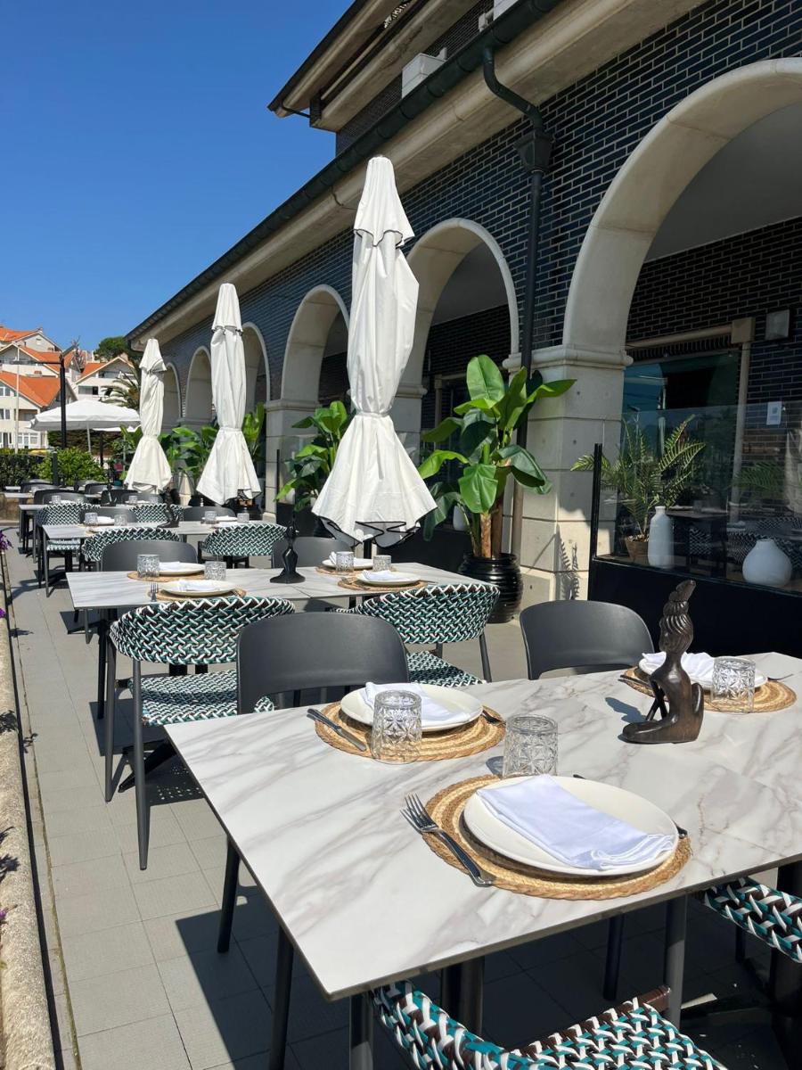 Un restaurante o sitio para comer en Hotel Milagros Golf