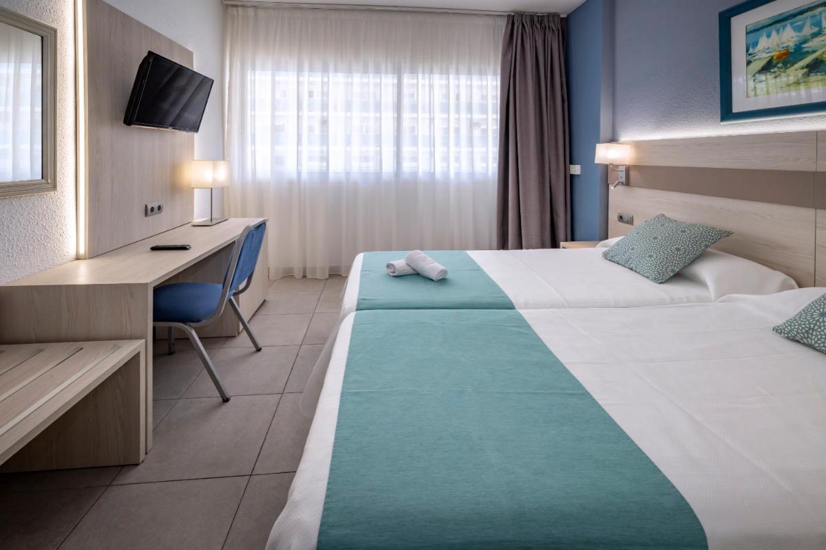 Cama o camas de una habitación en 4R Salou Park Resort I