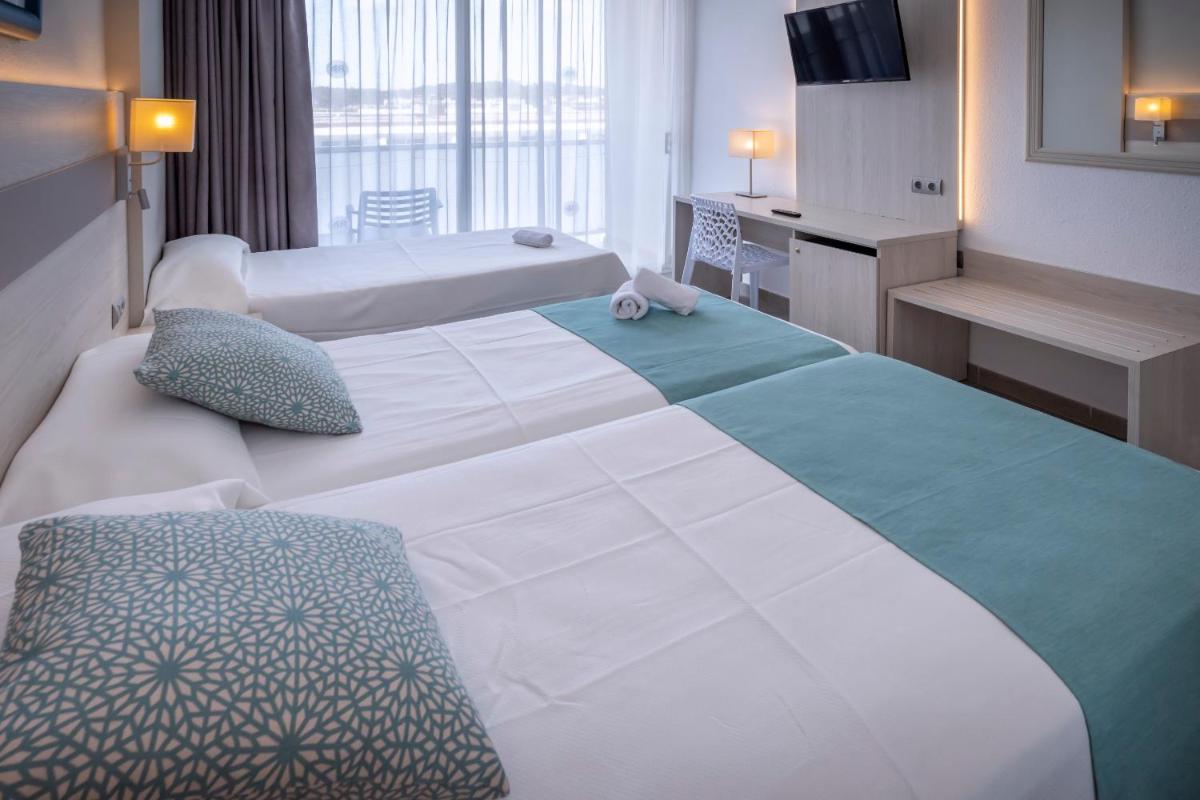 Cama o camas de una habitación en 4R Salou Park Resort I