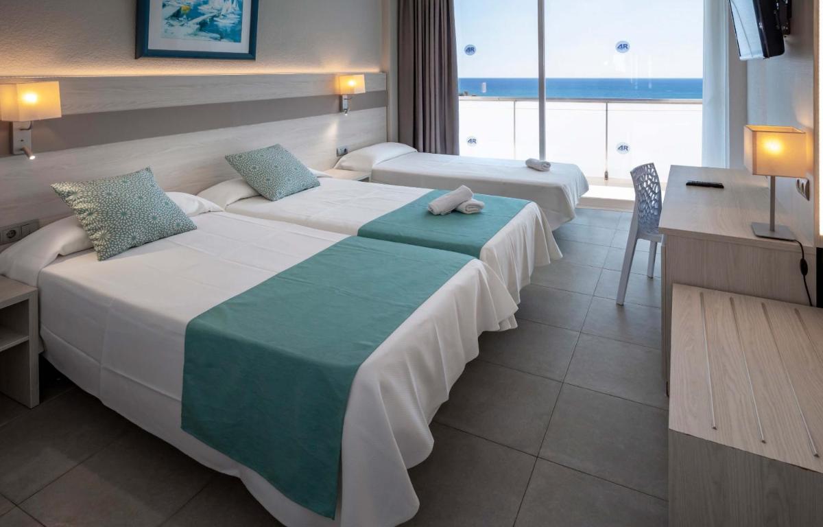 Cama o camas de una habitación en 4R Salou Park Resort I