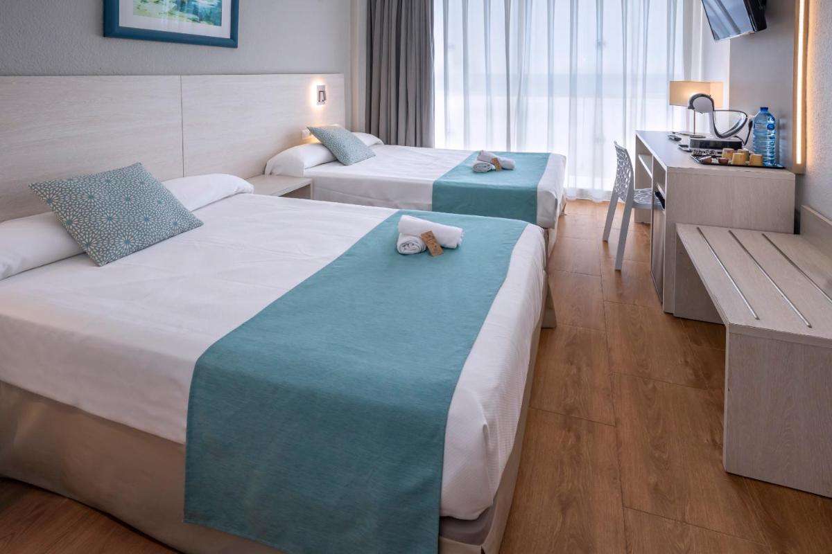 Cama o camas de una habitación en 4R Salou Park Resort I