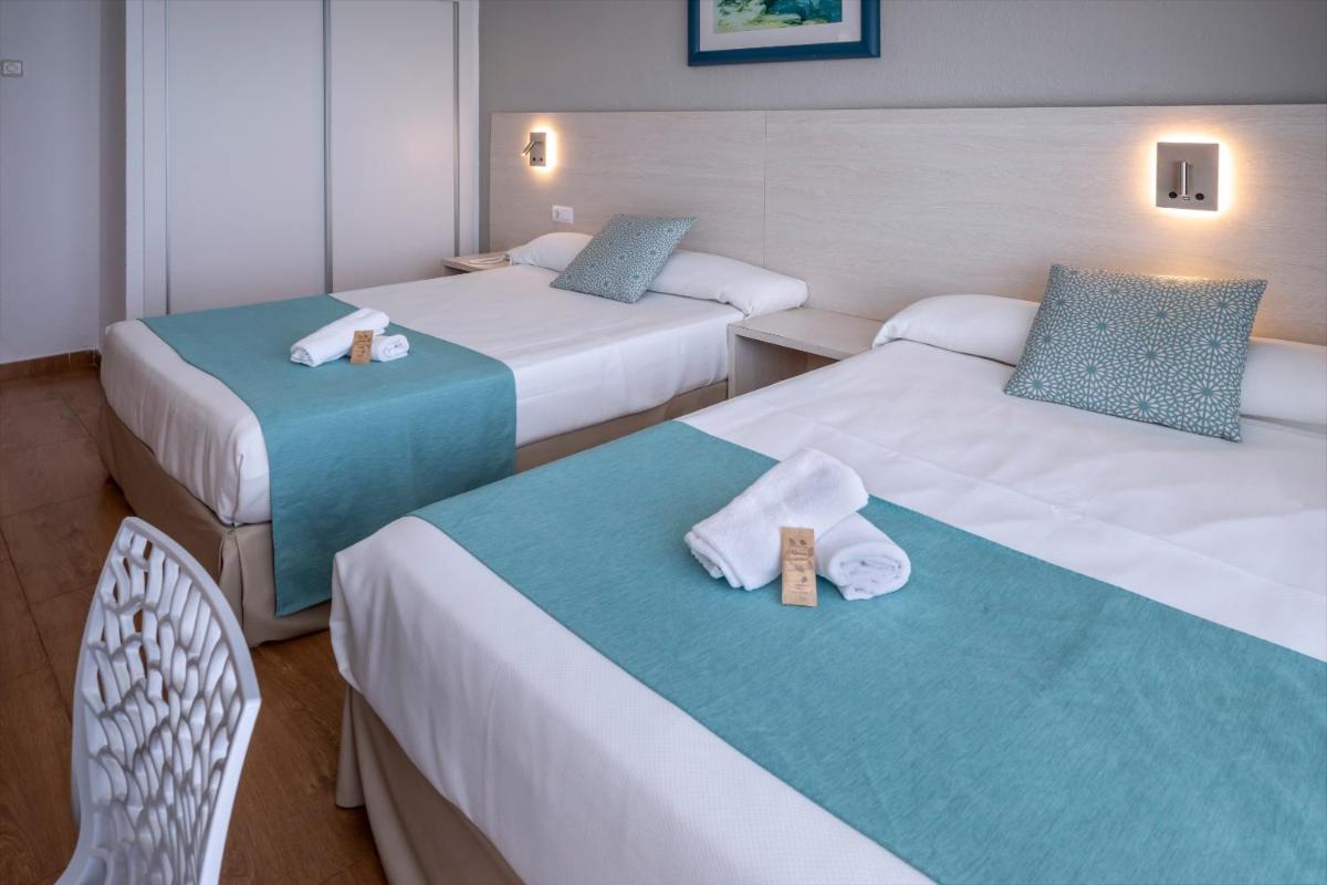 Cama o camas de una habitación en 4R Salou Park Resort I
