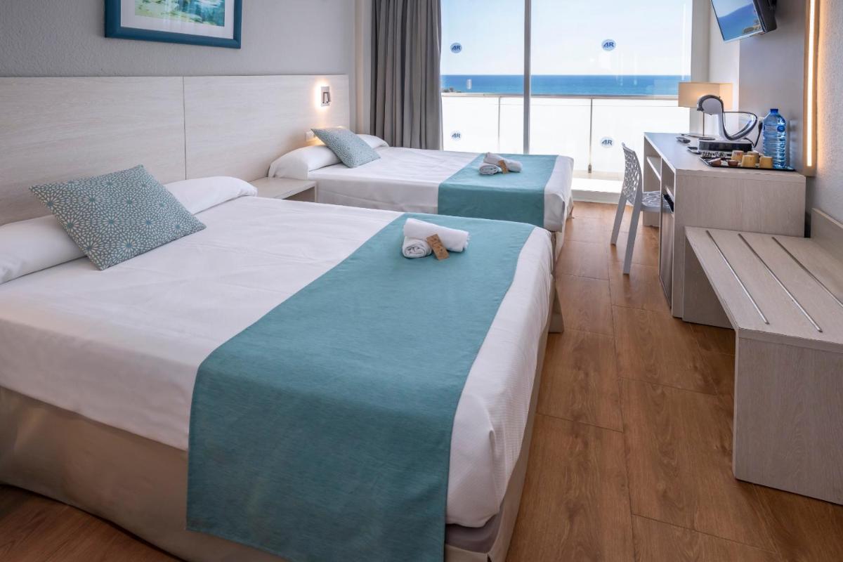 Cama o camas de una habitación en 4R Salou Park Resort I