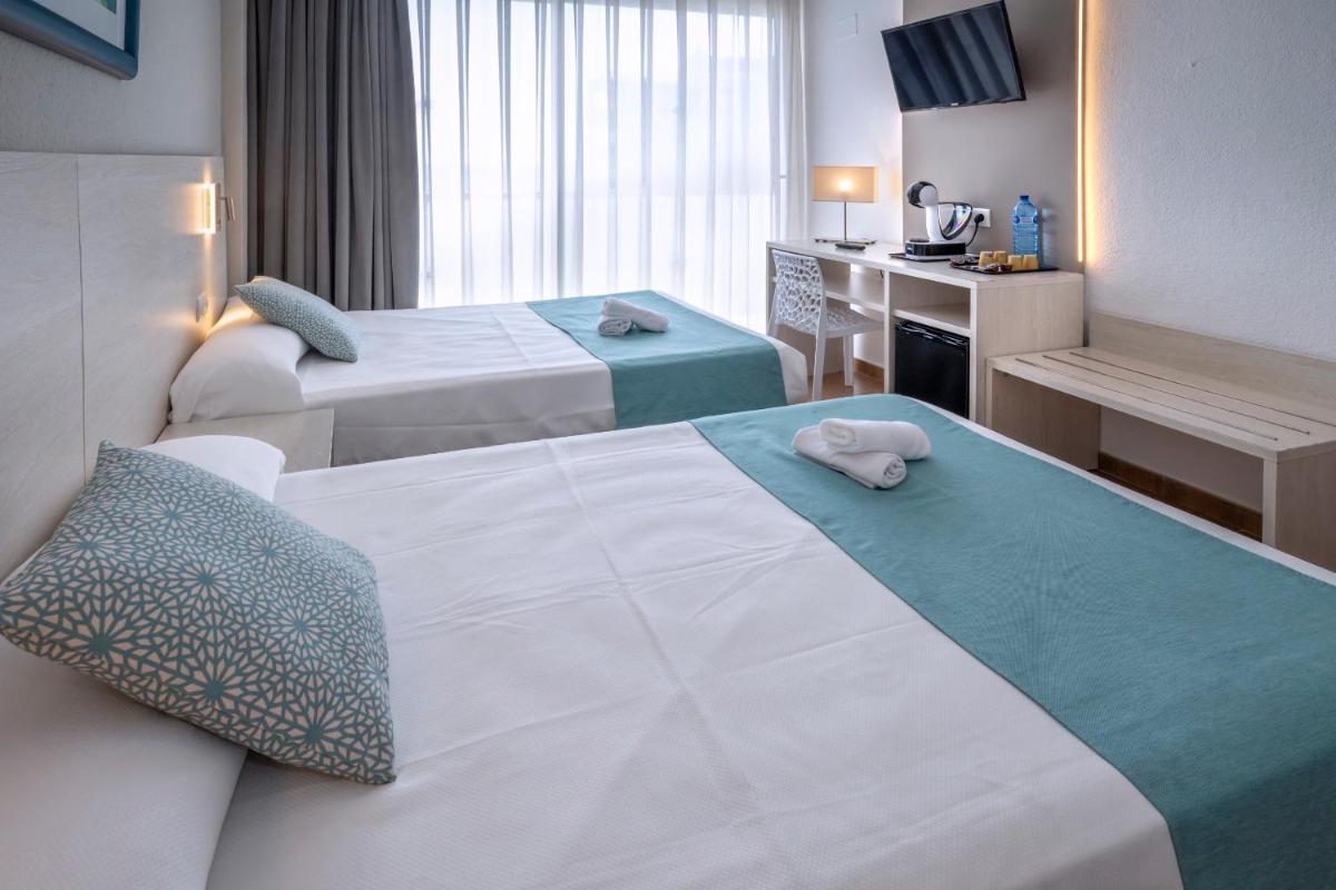 Cama o camas de una habitación en 4R Salou Park Resort I