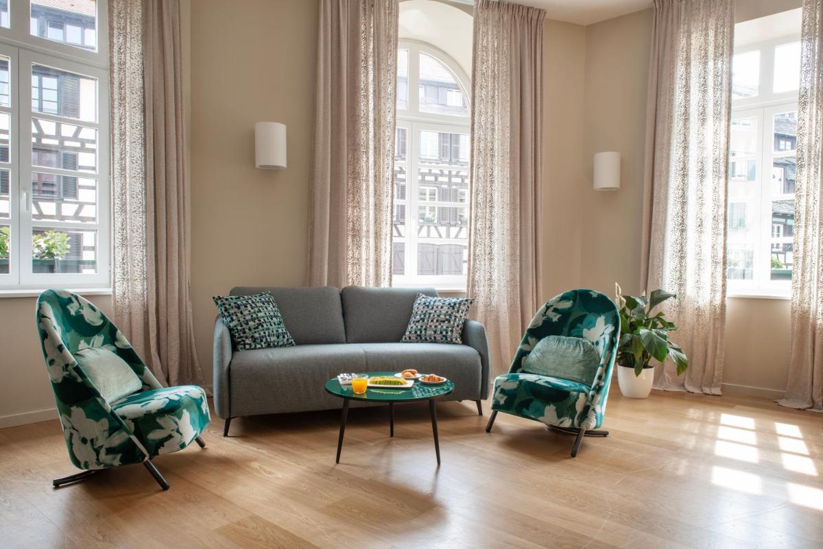 Coin salon dans l'établissement Hotel & Spa REGENT PETITE FRANCE