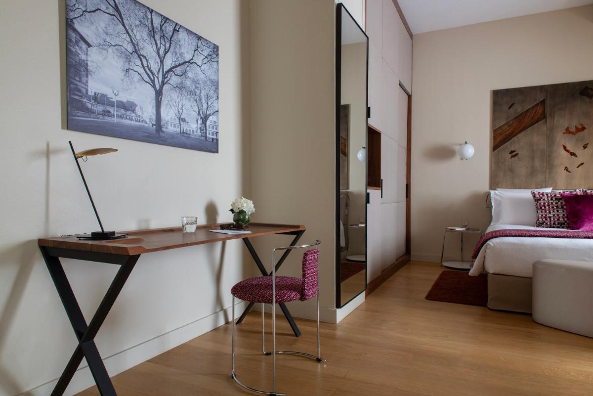 Un ou plusieurs lits dans un hébergement de l'établissement Hotel & Spa REGENT PETITE FRANCE
