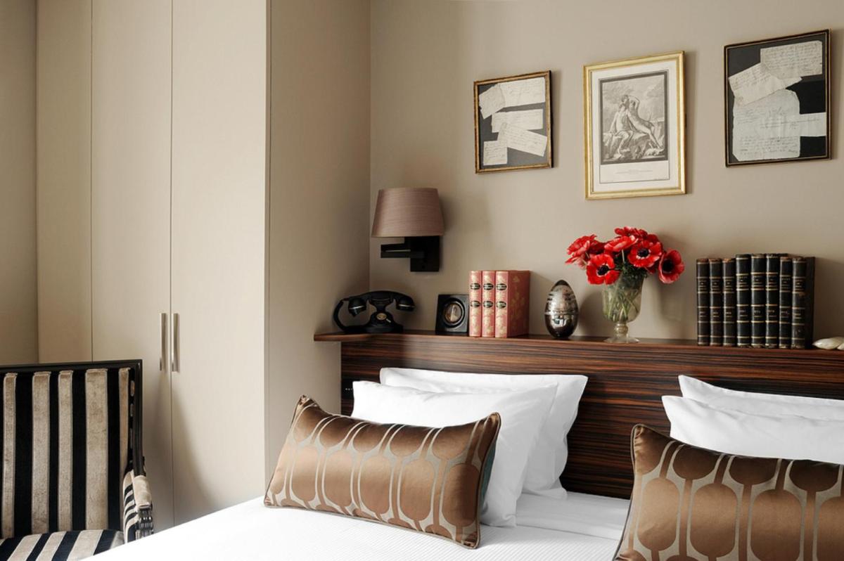 Un ou plusieurs lits dans un hébergement de l'établissement Hotel & Spa La Belle Juliette