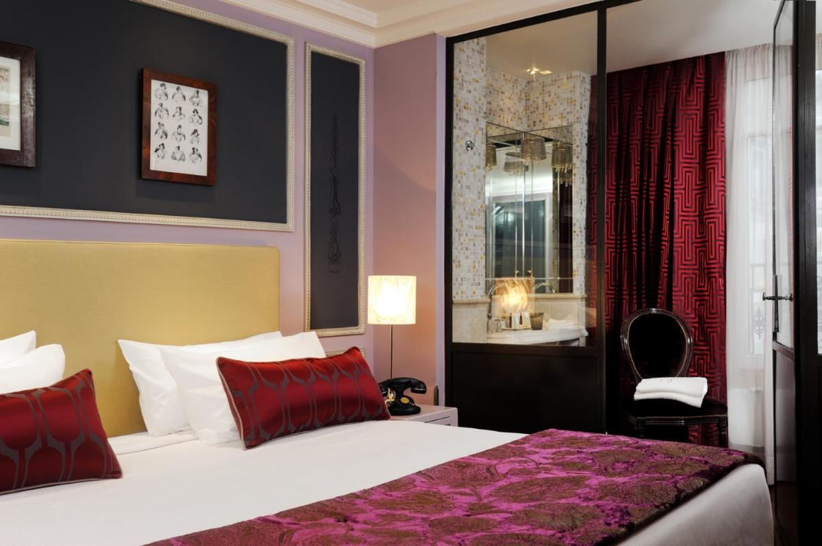 Un ou plusieurs lits dans un hébergement de l'établissement Hotel & Spa La Belle Juliette