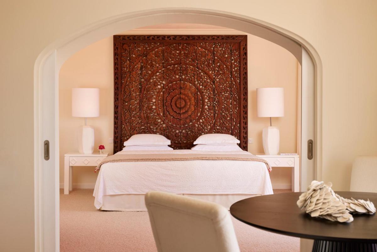 Uma cama ou camas num quarto em Vila Joya