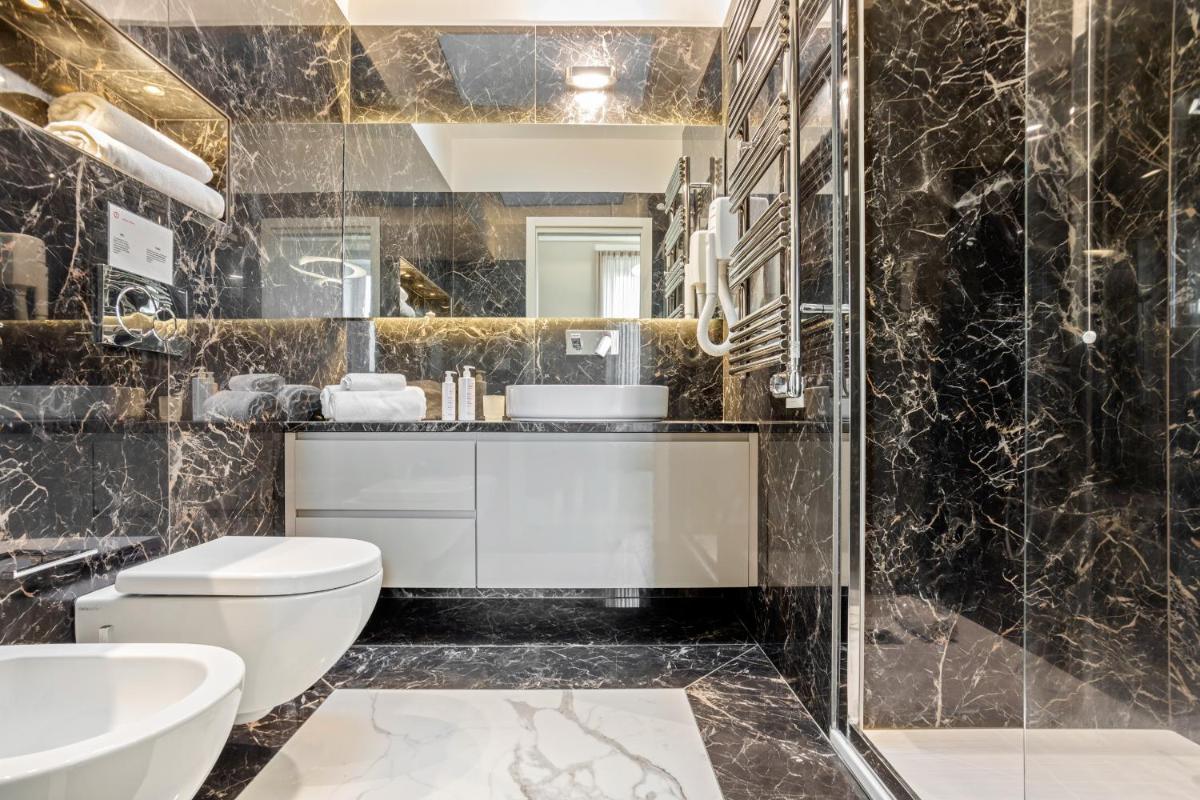 Riva Design Apartments by Wonderful Italy - Housity