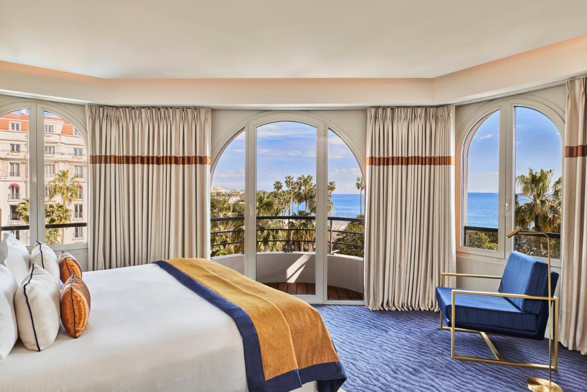 Un ou plusieurs lits dans un hébergement de l'établissement Hôtel Barrière Le Majestic Cannes