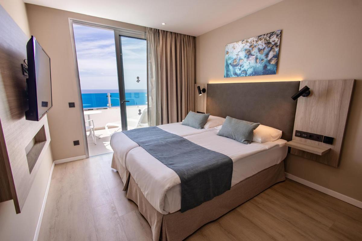 Cama o camas de una habitación en Servatur Puerto Azul