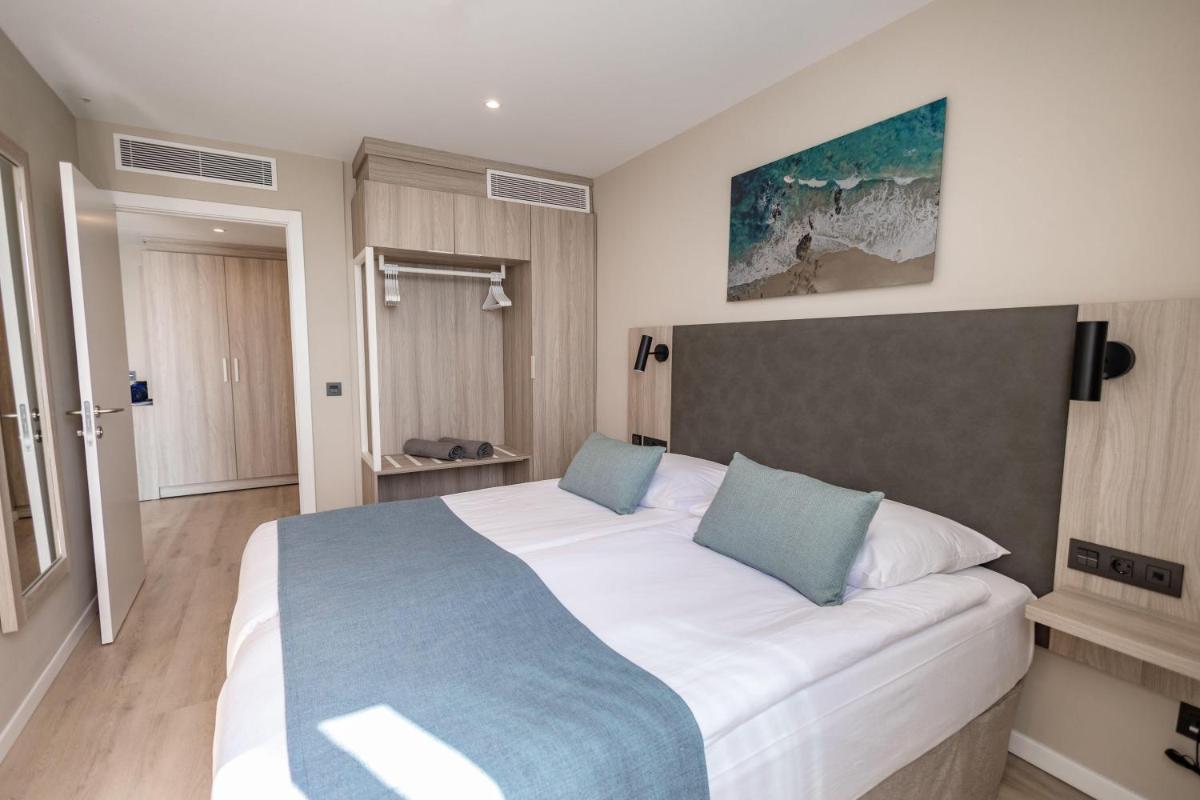 Cama o camas de una habitación en Servatur Puerto Azul