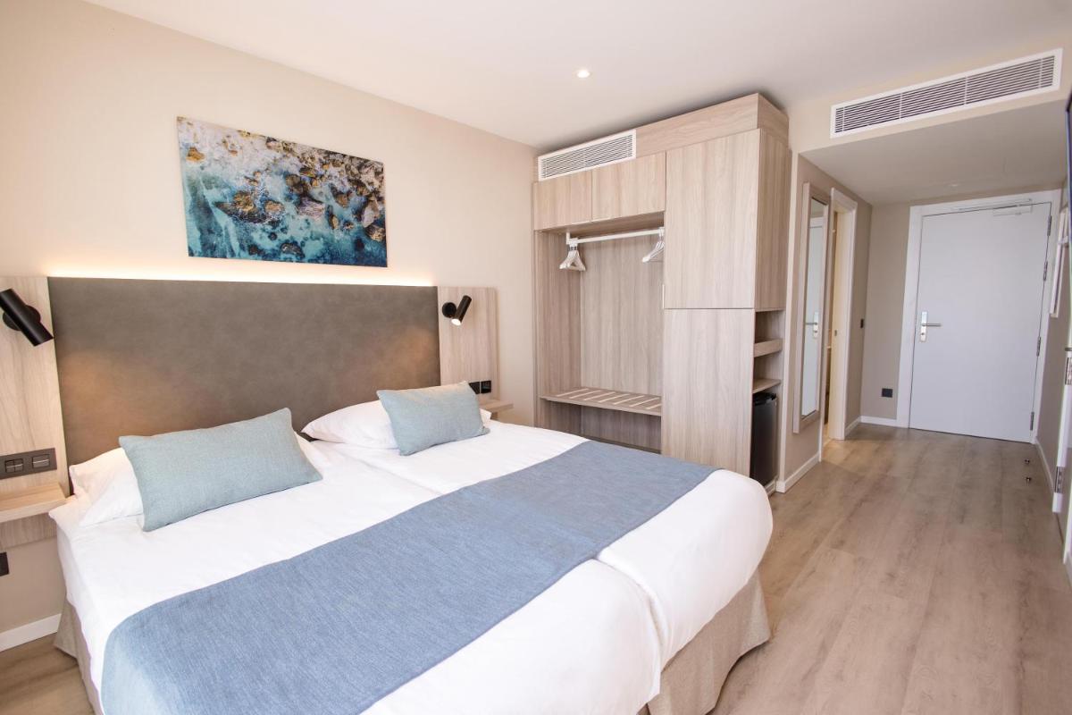 Cama o camas de una habitación en Servatur Puerto Azul