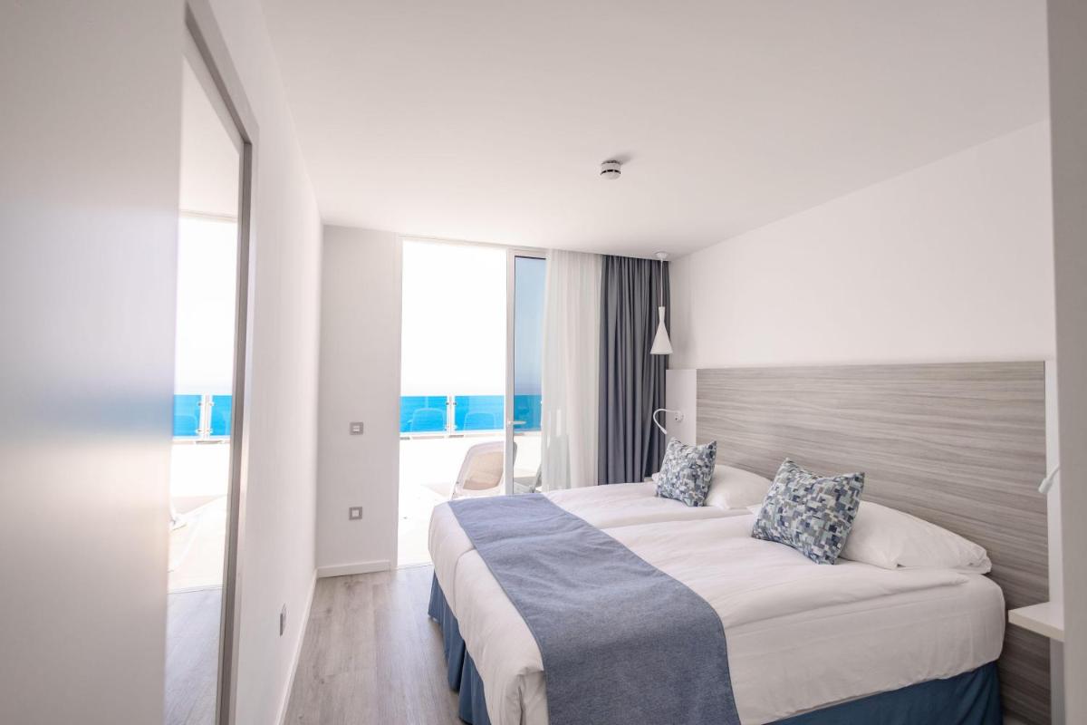 Cama o camas de una habitación en Servatur Puerto Azul