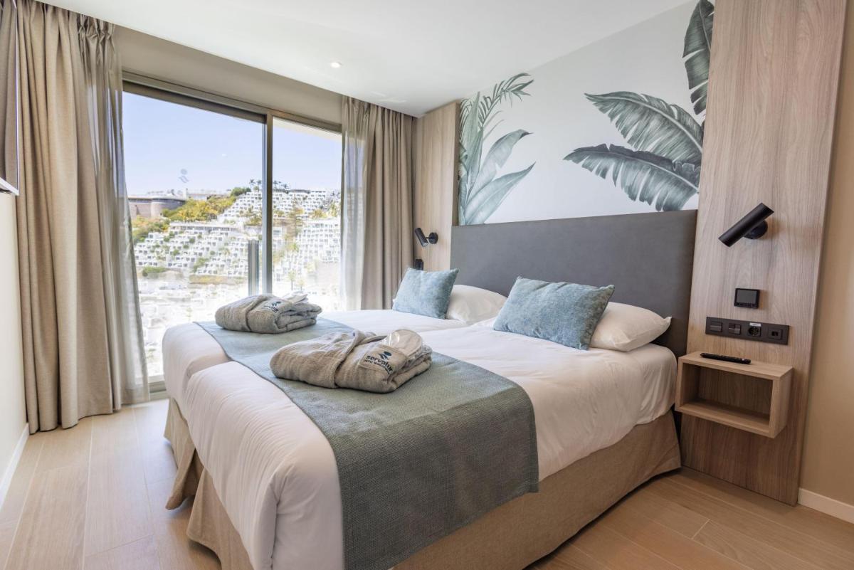 Cama o camas de una habitación en Servatur Puerto Azul