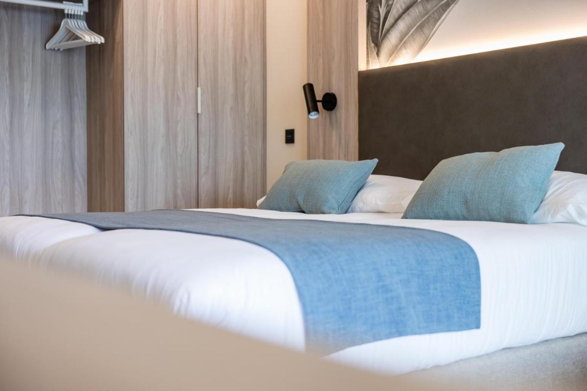 Cama o camas de una habitación en Servatur Puerto Azul