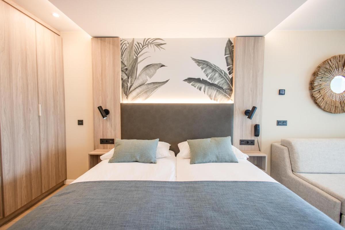 Cama o camas de una habitación en Servatur Puerto Azul