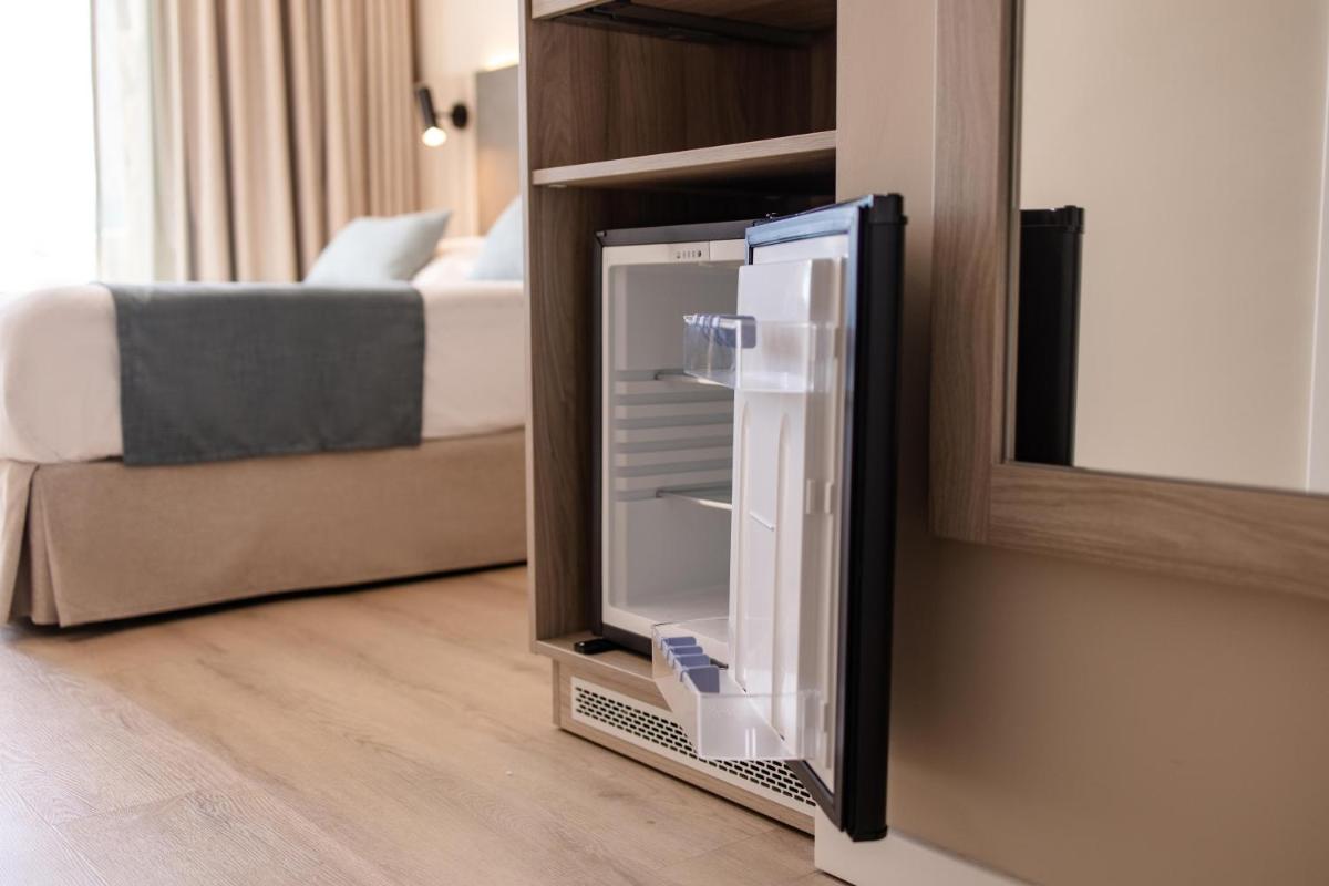 Cama o camas de una habitación en Servatur Puerto Azul