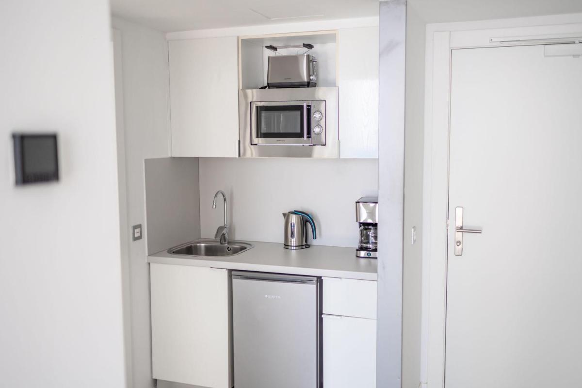 Una cocina o zona de cocina en Servatur Puerto Azul