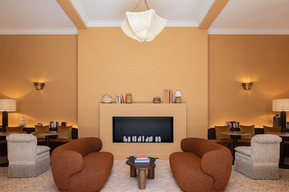 Coin salon dans l'établissement Hôtel Maison Chiberta
