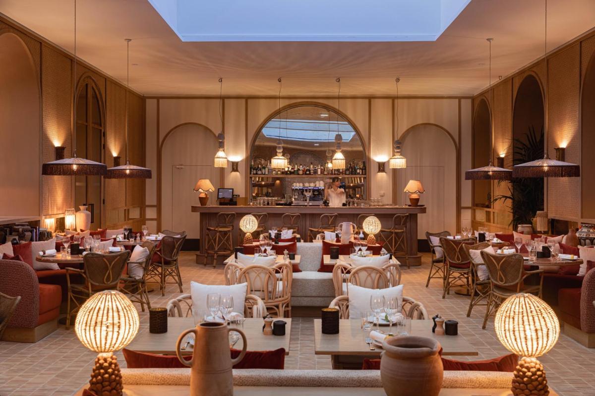 Restaurant ou autre lieu de restauration dans l'établissement Hôtel Maison Chiberta