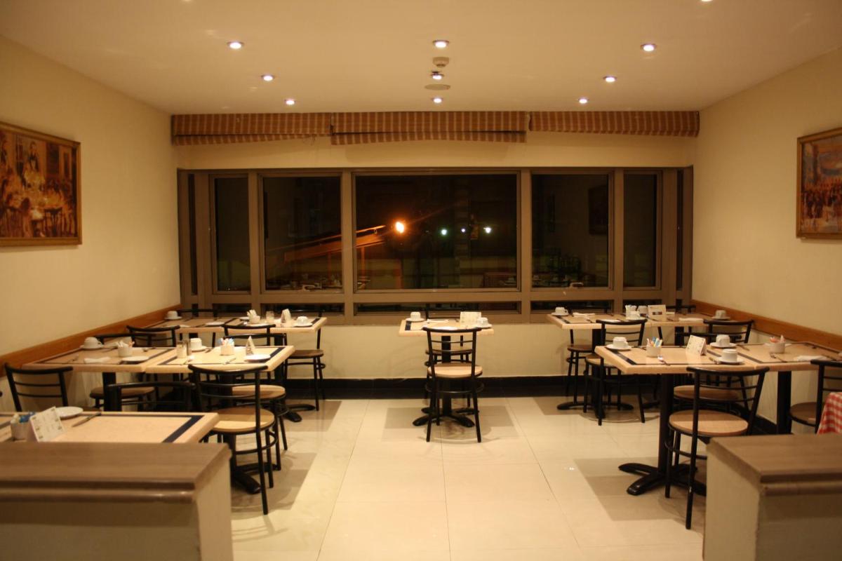Green Plaza Inn - Housity