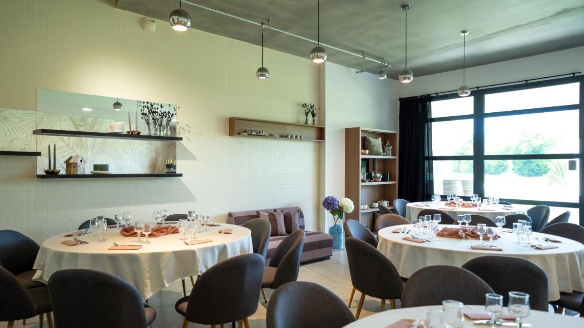 Restaurant ou autre lieu de restauration dans l'établissement Les Villas du Parc de la Chabotterie