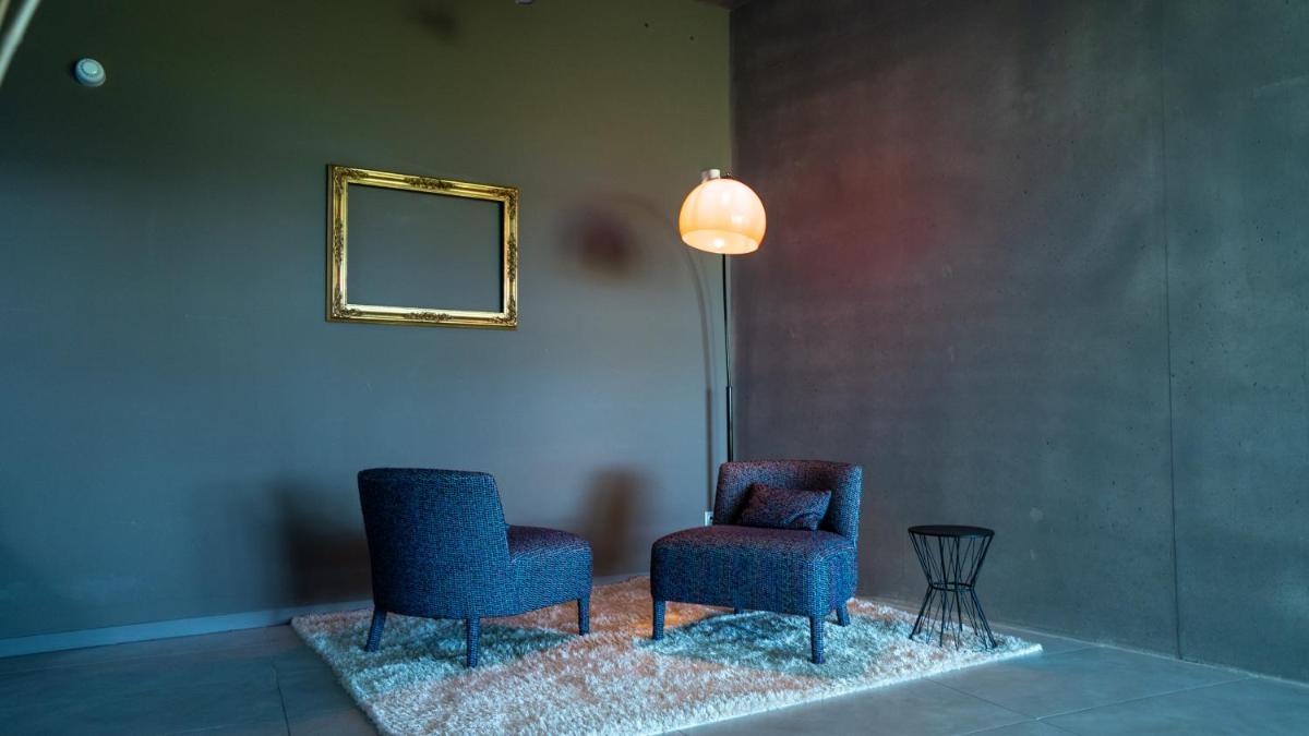 Coin salon dans l'établissement Les Villas du Parc de la Chabotterie
