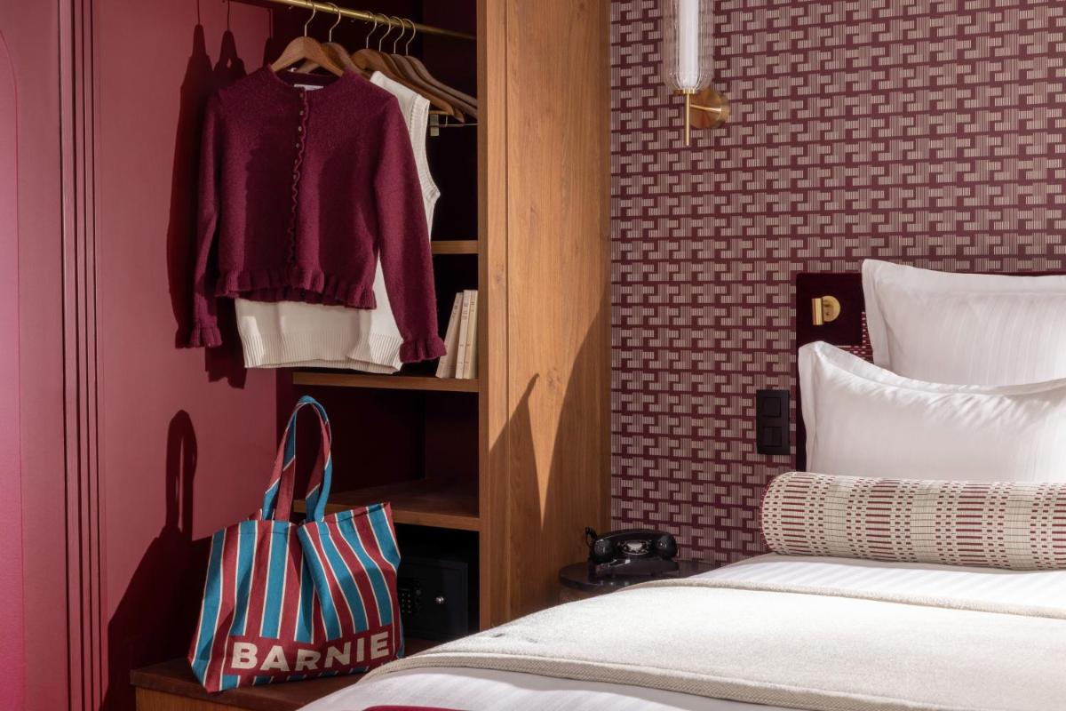 Un ou plusieurs lits dans un hébergement de l'établissement Hôtel Filigrane & Spa