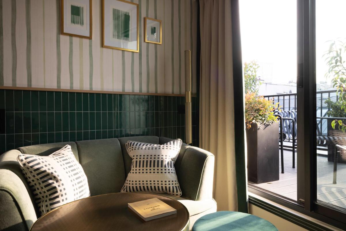 Coin salon dans l'établissement Hôtel Filigrane & Spa