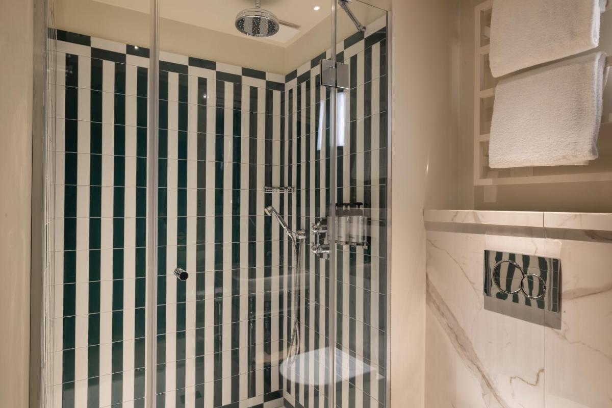 Salle de bains dans l'établissement Hôtel Filigrane & Spa