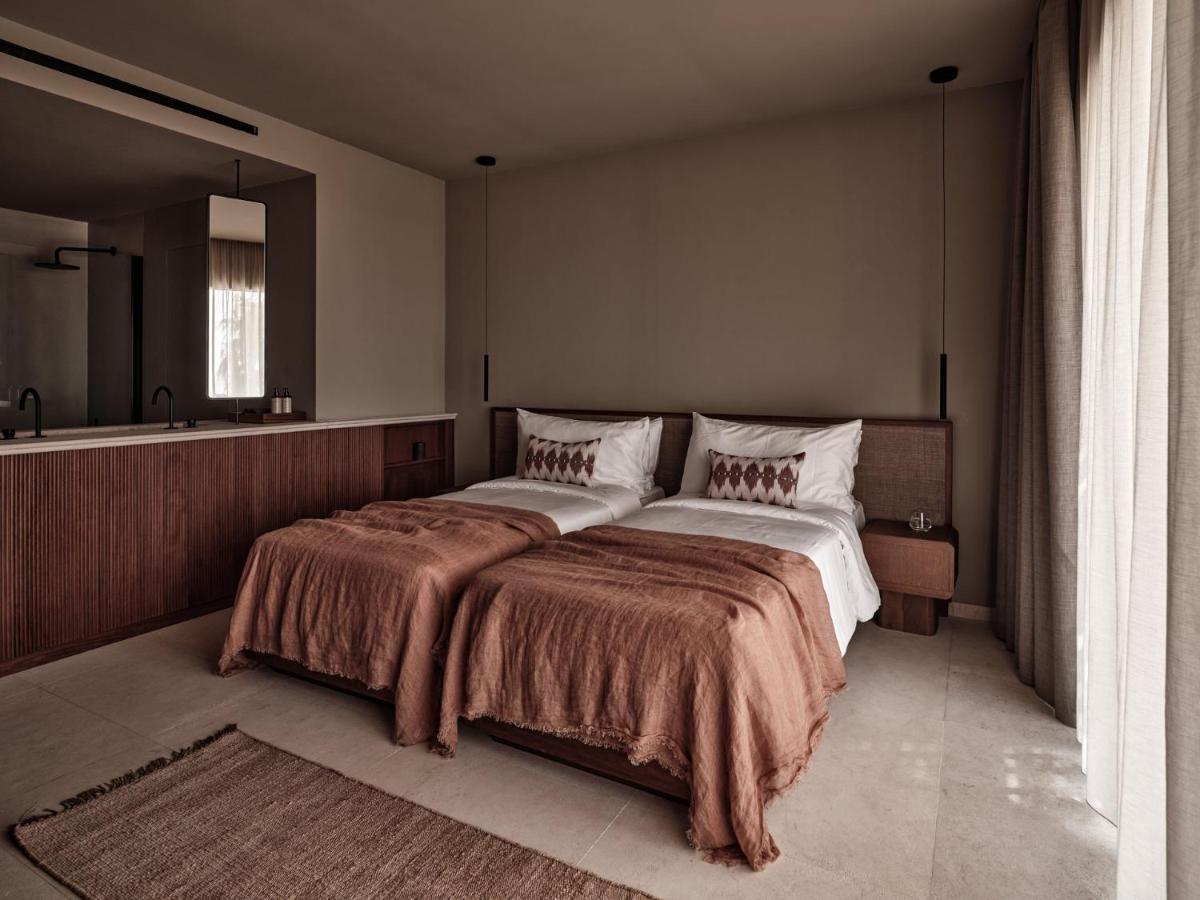 Cama o camas de una habitación en OKU Andalusia