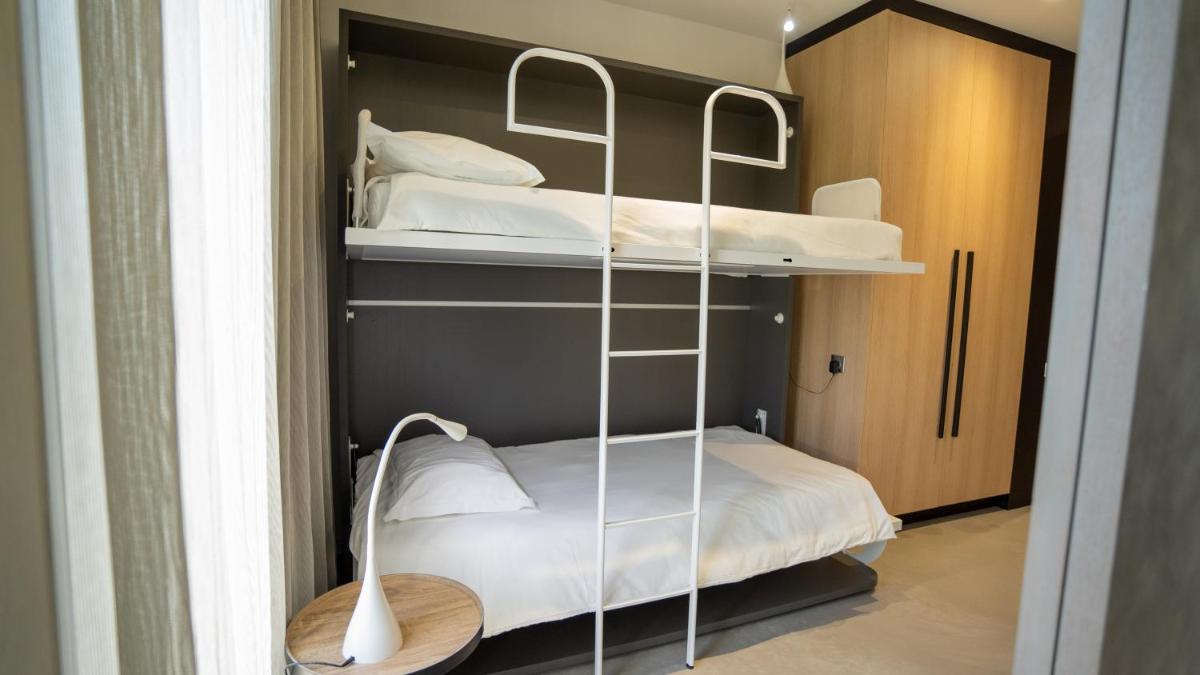 Un ou plusieurs lits dans un hébergement de l'établissement Les Villas du Parc de la Chabotterie