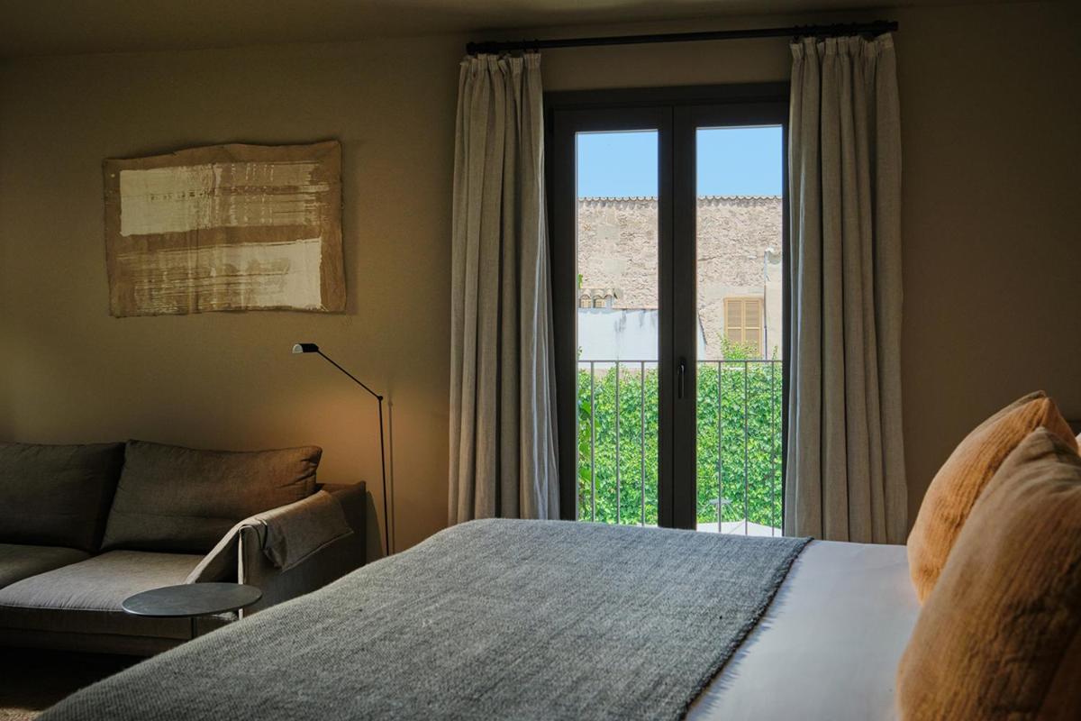 Cama o camas de una habitación en Can Aulí Luxury Retreat - Adults Only