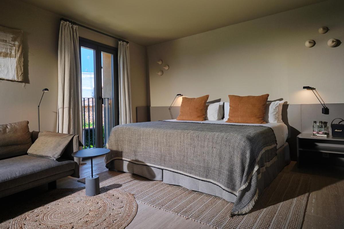 Cama o camas de una habitación en Can Aulí Luxury Retreat - Adults Only
