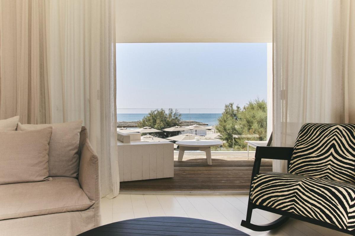 Coin salon dans l'établissement Hôtel Plage Palace & Spa
