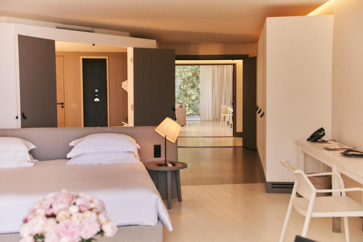 Un ou plusieurs lits dans un hébergement de l'établissement Hôtel Plage Palace & Spa