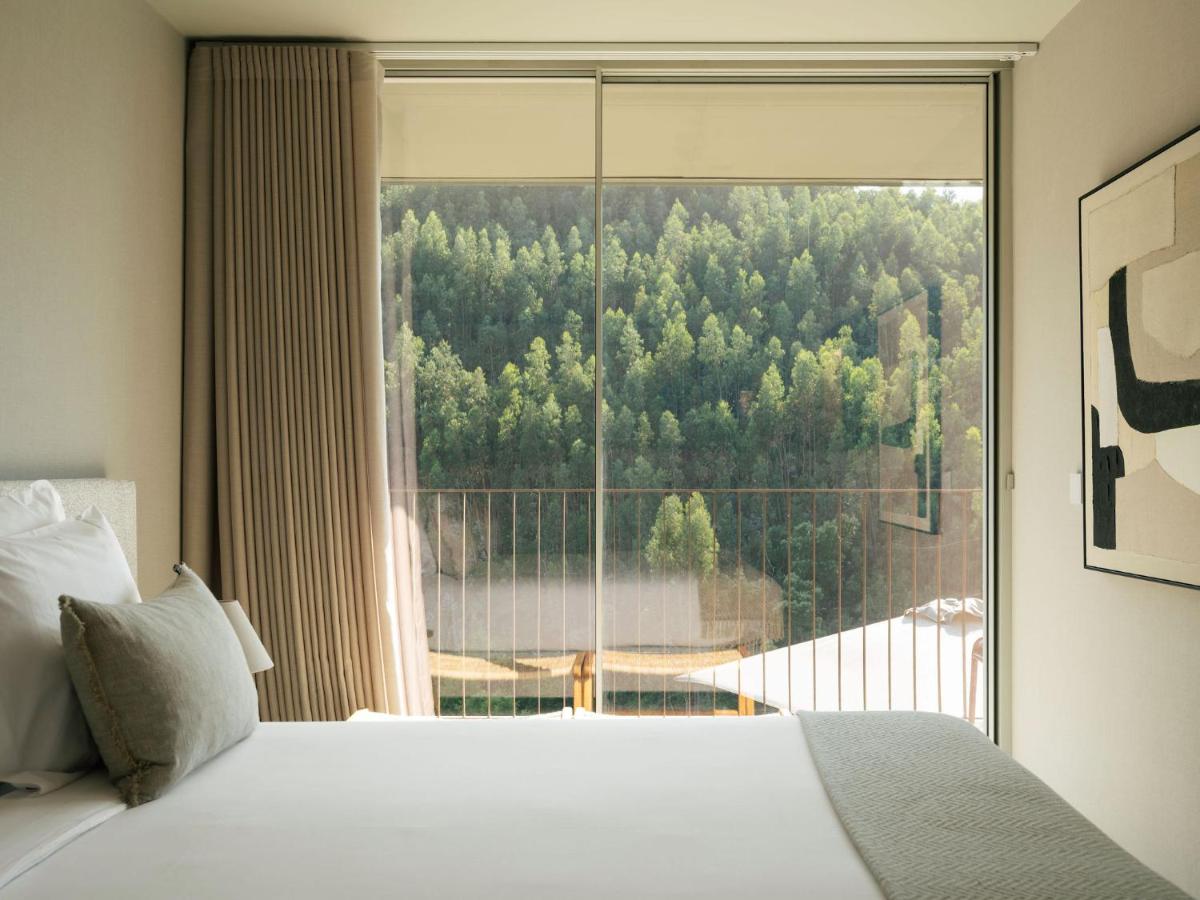 Uma cama ou camas num quarto em Octant Douro
