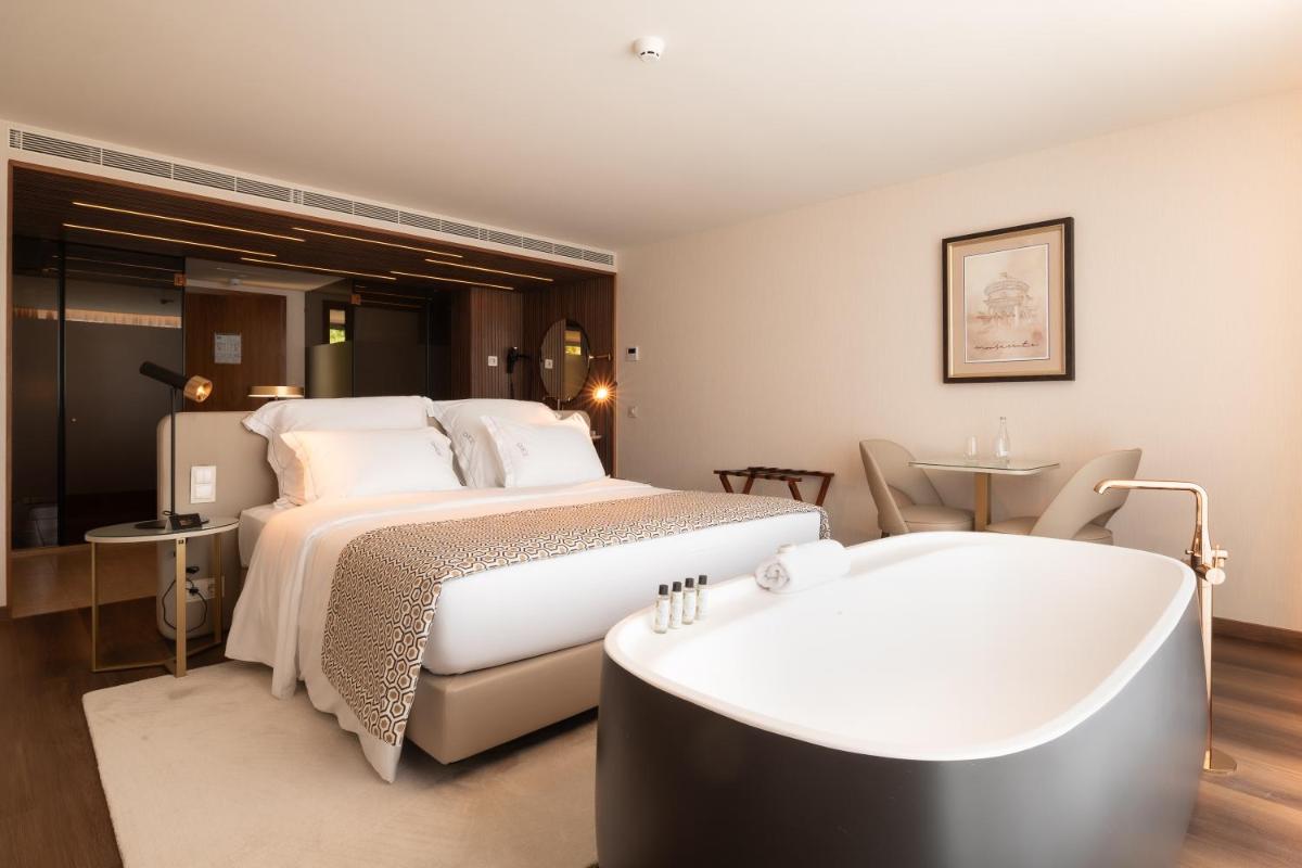 Uma cama ou camas num quarto em Quinta da Maquia Hotel