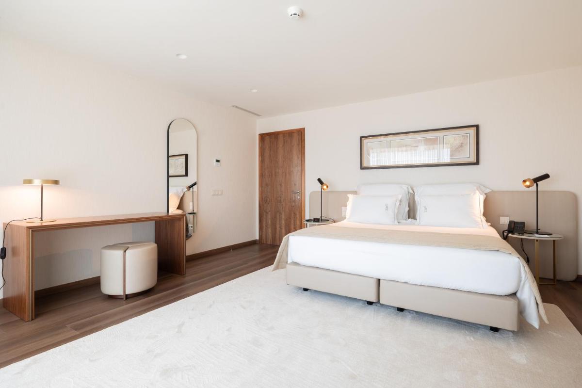 Uma cama ou camas num quarto em Quinta da Maquia Hotel