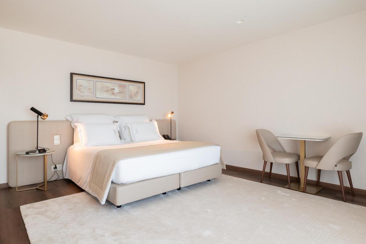 Uma cama ou camas num quarto em Quinta da Maquia Hotel