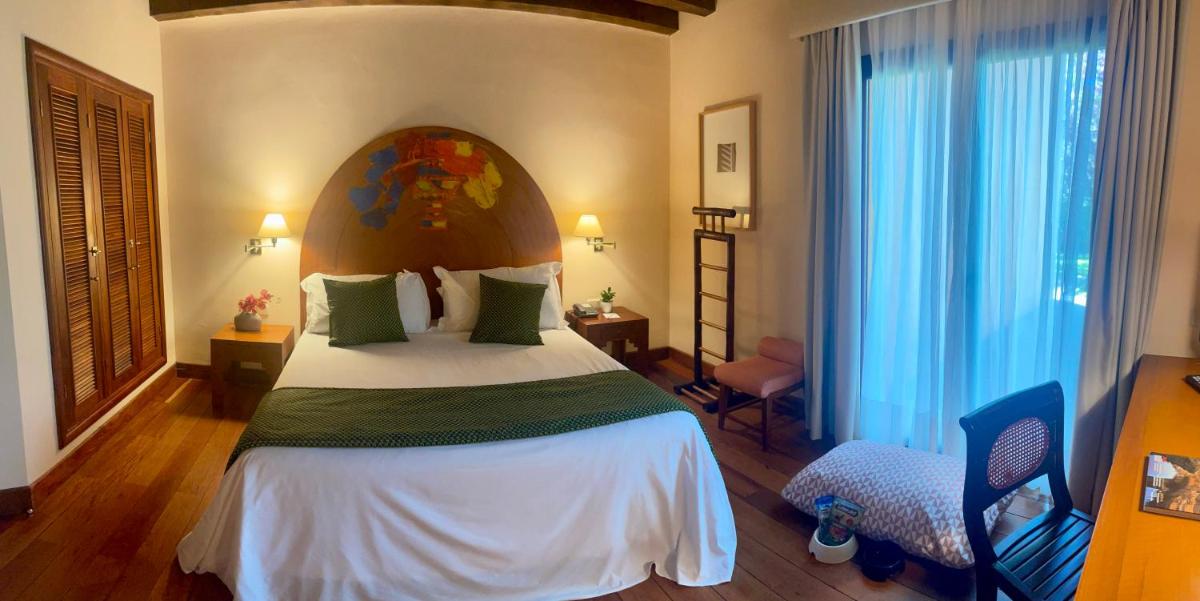 Cama o camas de una habitación en Hotel El Rancho