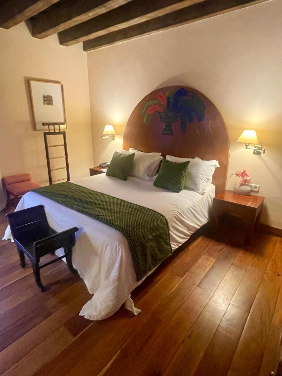 Cama o camas de una habitación en Hotel El Rancho
